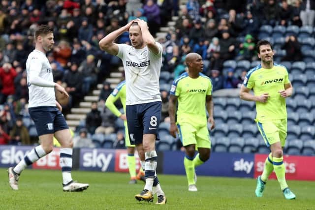 Alan Browne holds his head in his hands after missing a penalty against Derby, watched by Paul Gallagher (left)