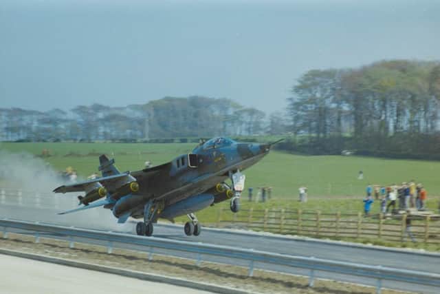 Jaguar taking off from the M55 motorway, in April 1975