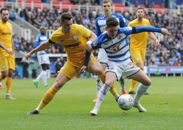 Preston North End's Billy Bodin vies for possession with Reading's Liam Kelly