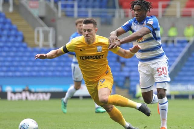 Preston North End's Billy Bodin is fouled by Reading's Omar Richards