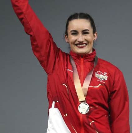 Sarah Davies celebrates winning Commonwealth Games silver.