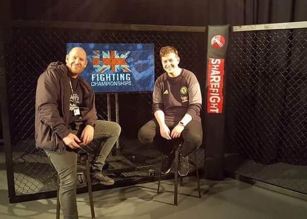 UCLan course leader in television production and media production,  Adam Robson and final year student Samuel Liles on the set of Sharefight Presents: UK Fighting Championships.