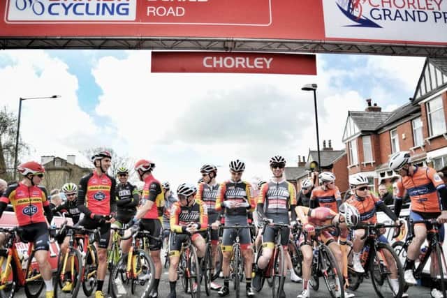 Cyclists line up at the start line of the Chorley Grand Prix