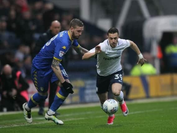 Billy Bodin in the thick of the action against Leeds.