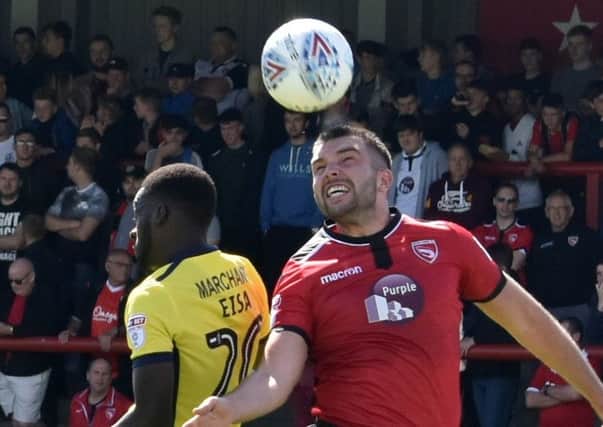 Morecambe manager Jim Bentley admits he made a mistake in replacing Alex Kenyon (above) on Tuesday night