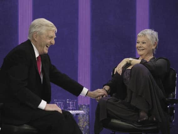 Michael Parkinson with Judi Dench on his show in 2004
