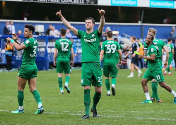 Paul Huntington leads the celebrations at the final whistle at Loftus Road.