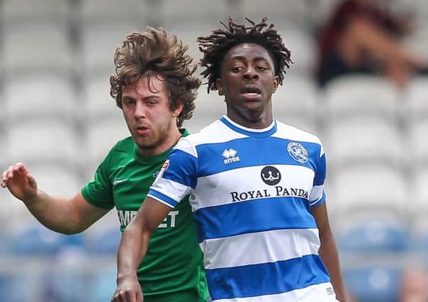 Ben Pearson battles for possession with QPR's Bright Osayi-Samuel