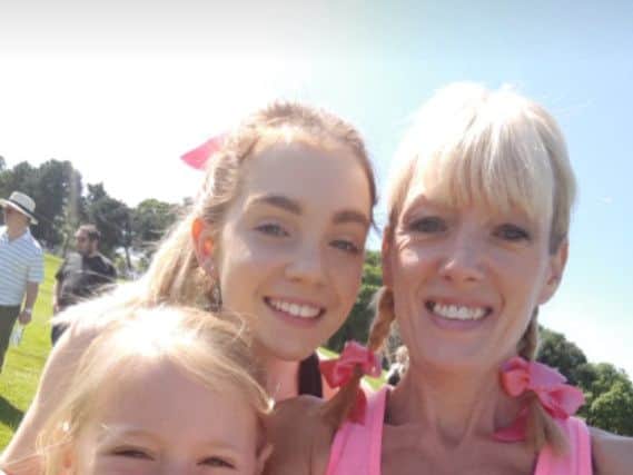 Eleanor McMonagle,of Penwortham, with daughters Sian and Anais at a previous Race for Life event