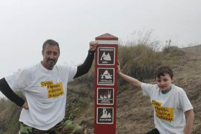 David Capitan, of Fulwood, at the top of Machu Pichu with his grandad David Finch, 58, to raise funds for Cystic Fibrosis Trust.