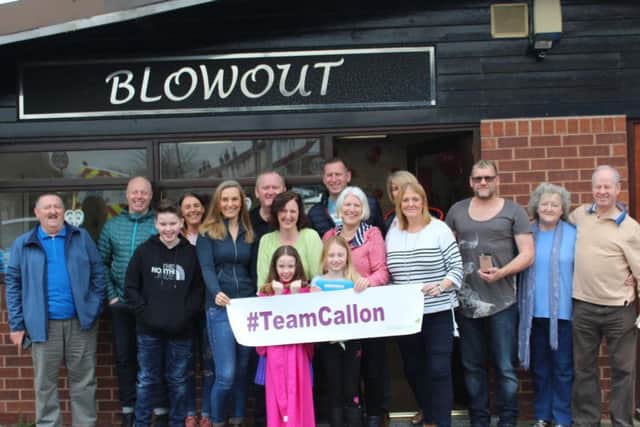 Erin Gibbons with her team of supporters outside Blow Out, in Leyland