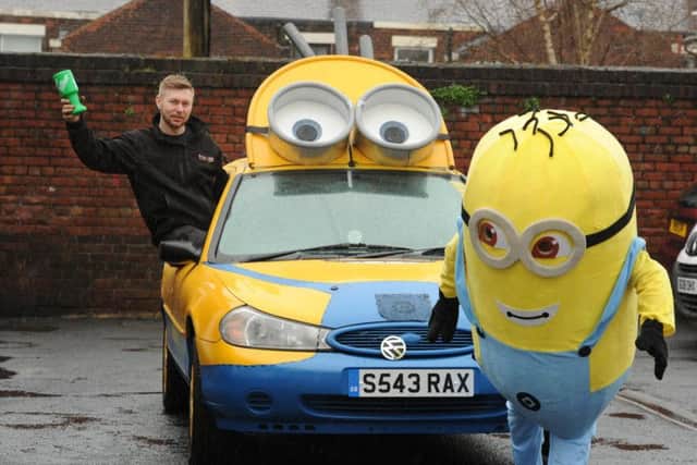Todd Shimell, a member of the Minions team, will be driving to Benidorm in a charity fund-raiser after doing up a 60 Ford Mondeo. Photos: Neil Cross.