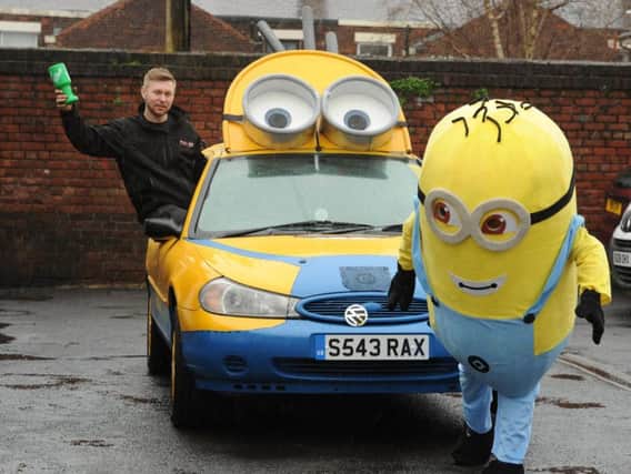 Todd Shimell, a member of the Minions team, will be driving to Benidorm in a charity fund-raiser after doing up a 60 Ford Mondeo. Photos: Neil Cross.