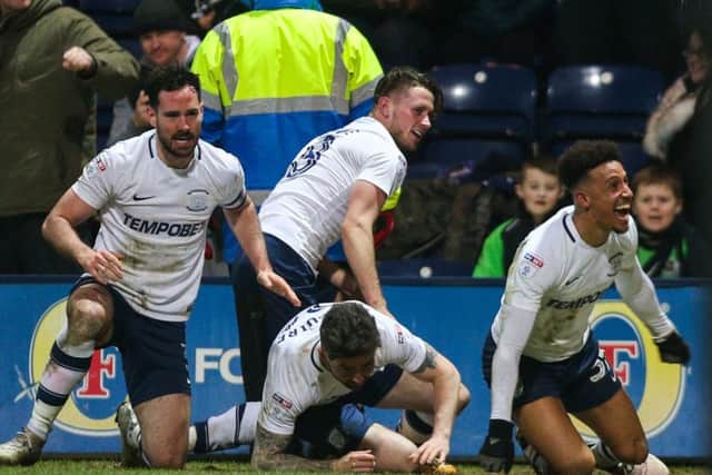 Greg Cunningham joins in the celebrations for Sean Maguire's winner against Bristol City