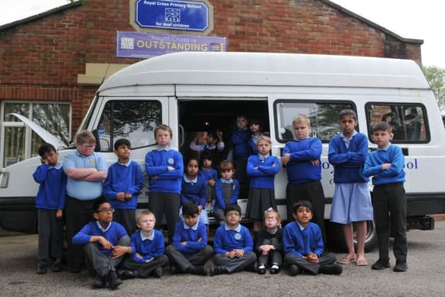 Photo Neil Cross
Pupils at Royal Cross Primary School for the deaf are sad as their mini bus has died.They are short of Â£1,000 to put in a bid for Variety Club bus