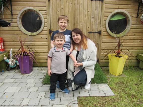 Leanne Witts with her sons Charlie and Harry