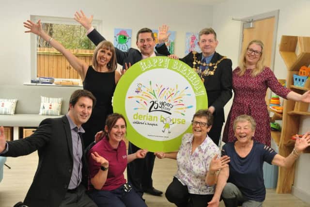 Staff and Mayor Coun Mark Perks at Derian House to mark the launch of its 25th anniversary campaign