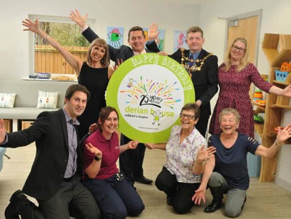 Staff and Mayor Coun Mark Perks at Derian House to mark the launch of its 25th anniversary campaign