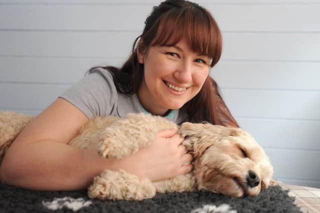 Michelle Corrigan from Clinical Canine Massage Lancashire with dog Bella.