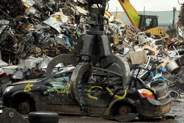 A car being taken apart prior to recycling.