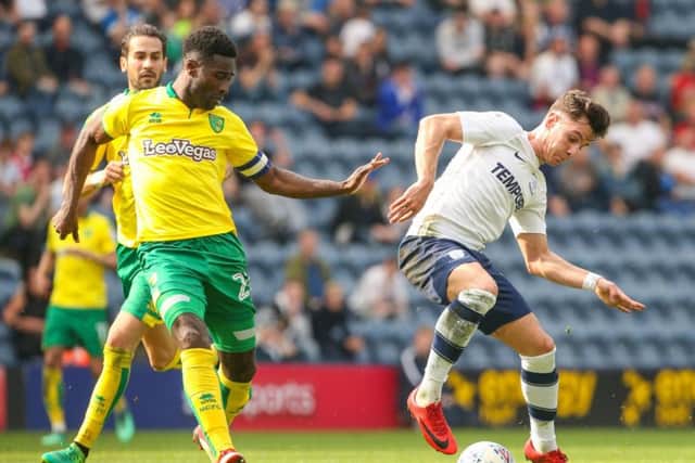 Josh Harrop in the thick of the action for Preston against Norwich