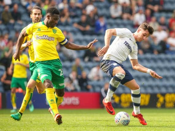 Josh Harrop in the thick of the action for Preston against Norwich