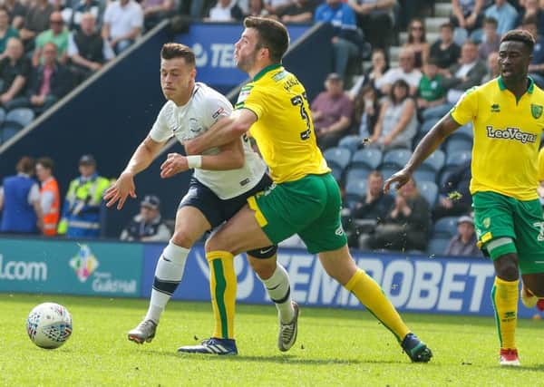 Preston North End's Billy Bodin is fouled by Norwich City's Grant Hanley