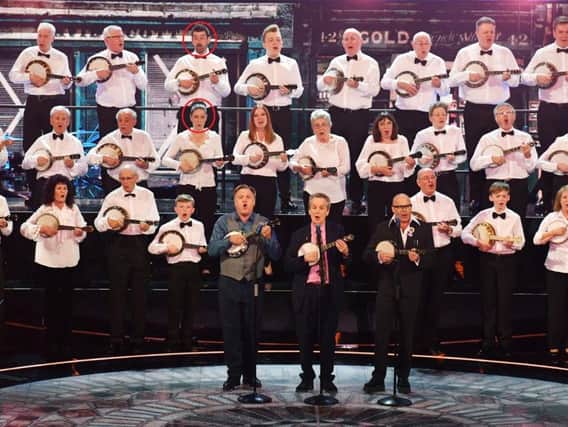 Members of the George Formby Society - including Blackpool's Alan and Alyson Yates, circled - perform at the Royal Albert Hall in London during a star-studded concert to celebrate The Queen's Birthday Party as part of her 92nd birthday celebrations, fronted by Ed Balls, Frank Skinner and Harry Hill