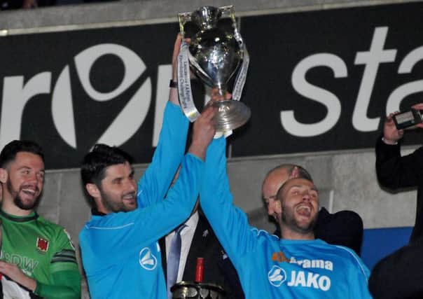 Chorley duo Andy Teague and Adam Roscoe lift the LFA Challenge Trophy
