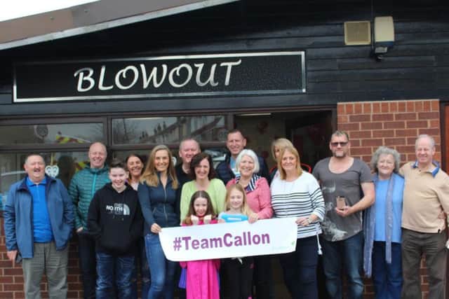Erin Gibbons with her team of supporters outside Blow Out, in Leyland