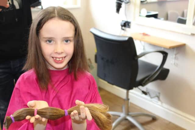 Erin Gibbons with her new hair cut