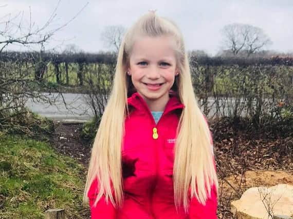 Six-year-old Olivia Wilson from Catterall is cutting her hair off to raise funds for her friend Phoebe and cousin Jack.