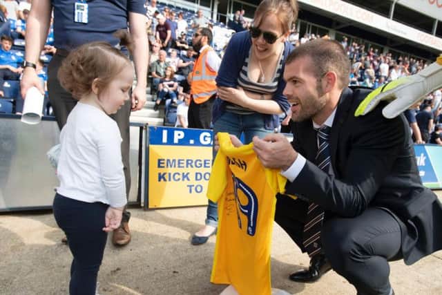 Midfielder John Welsh with Jorgie Rae Griffiths at the Preston North End match against Norwich City