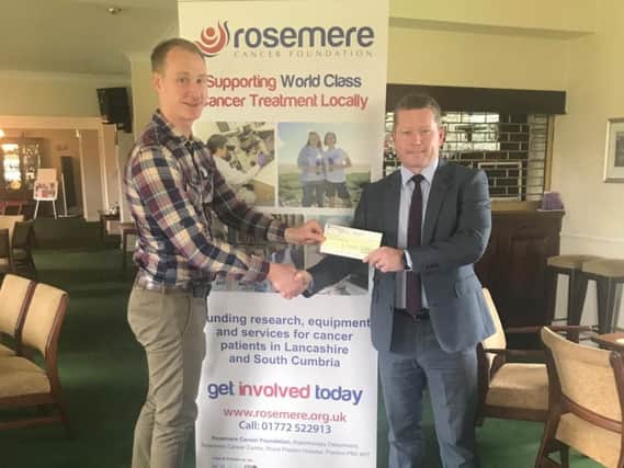 Enterprise Rent-A-Car's regional vehicle remarketing sale manager Gerry McGonagle presented Rosemere Cancer Foundations head of fund-raising Dan Hill with a donation of 1,500 from the Enterprise Holdings Foundation