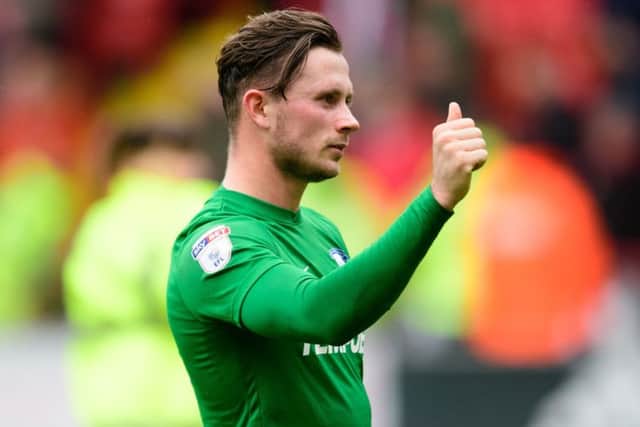 Matchwinner Alan Browne gives the PNE fans the thumbs-up at Sheffield United