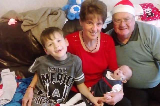 Linda and Kevin Bowman with their grandchildren Oliver and Abigail Bowman