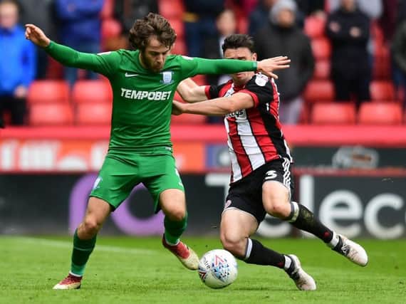 Ben Pearson in the thick of the action against Sheffield United
