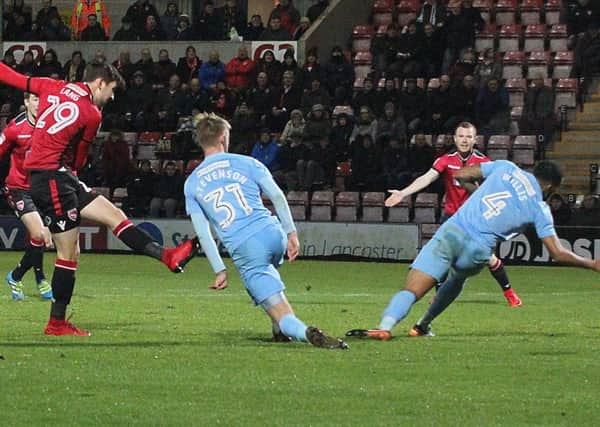 Callum Lang scores the second goal when Morecambe beat Coventry City at the Globe Arena in December