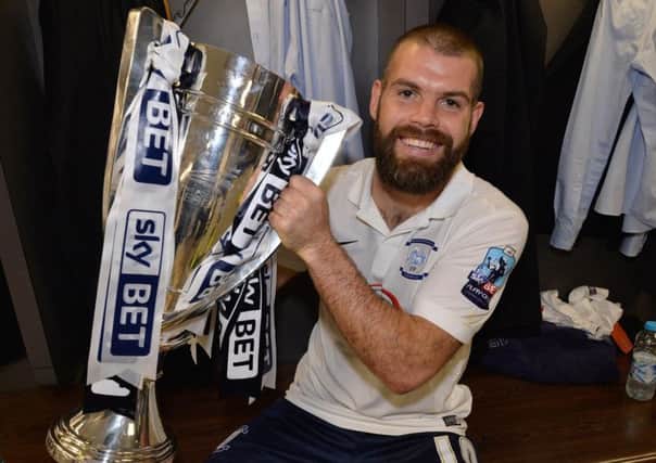 John Welsh with the play-off trophy at Wembley