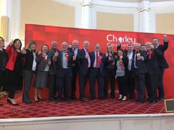 Labour members cheering the result