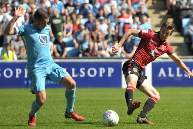 Andy Fleming battles for possession at the Ricoh Arena. Picture: B&O PRESS PHOTO