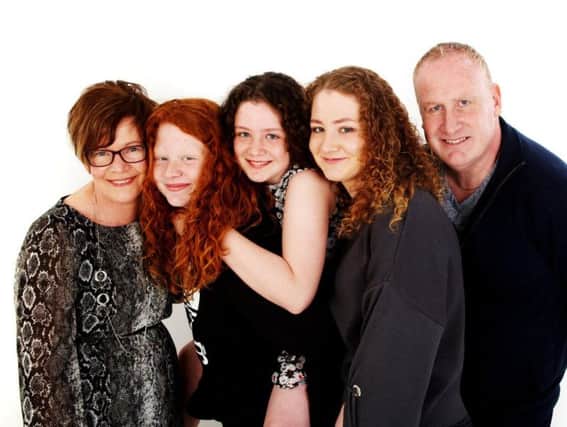 Anne-Marie with husband Brian and daughters Chloe, Ellie and Rosie