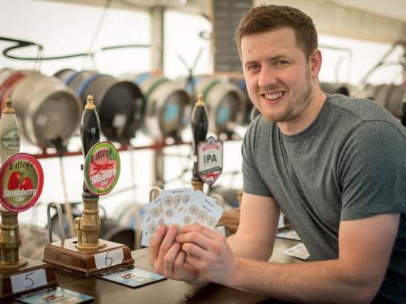 Beer festival at Garstang Cricket Club. Ian Walling in charge of the tokens. Photos by Martin Bostock.