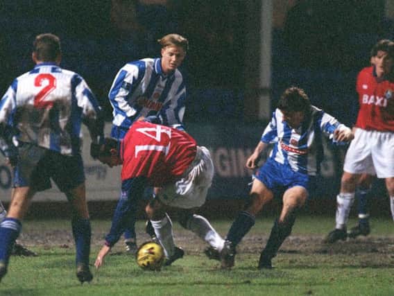 Kurt Nogan is tripped by Peter Beardsley in Preston's AWS tie at Hartlepool in January 1999