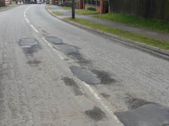 A correspondent complains about potholes