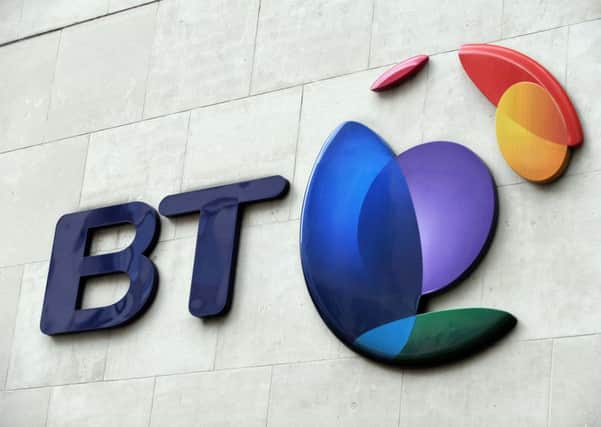 File photo dated 05/10/13 of a BT sign. The telecoms giant is to axe around 13,000 jobs over three years as it aims to cut costs. PRESS ASSOCIATION Photo. Issue date: Thursday May 10, 2018. The company said the job losses would mainly affect back office and middle management roles. See PA story CITY BT. Photo credit should read: Nick Ansell/PA Wire