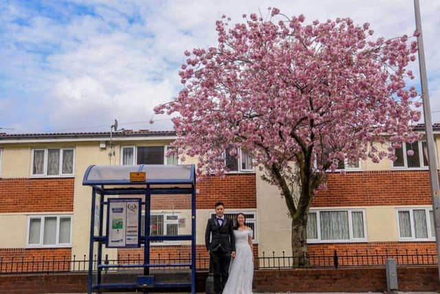 The couple were photographed in their wedding outfits enjoying a walk through UCLans Preston Campus.