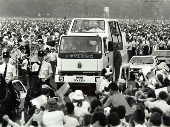 Pope John Paul II in his Leyland-built Popemobile during his 1982 visit to the town and the UK.