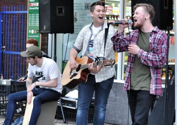 Driftwood performing outside the Spar shop in last year's Penwortham Live