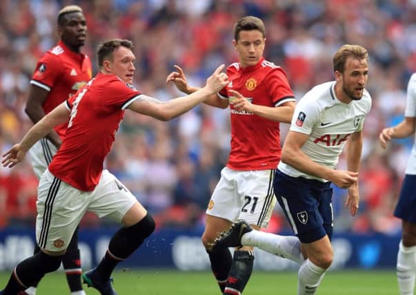 Phil Jones (left) and Ander Herrera (centre) with Tottenham's Harry Kane during the FA Cup semi-final